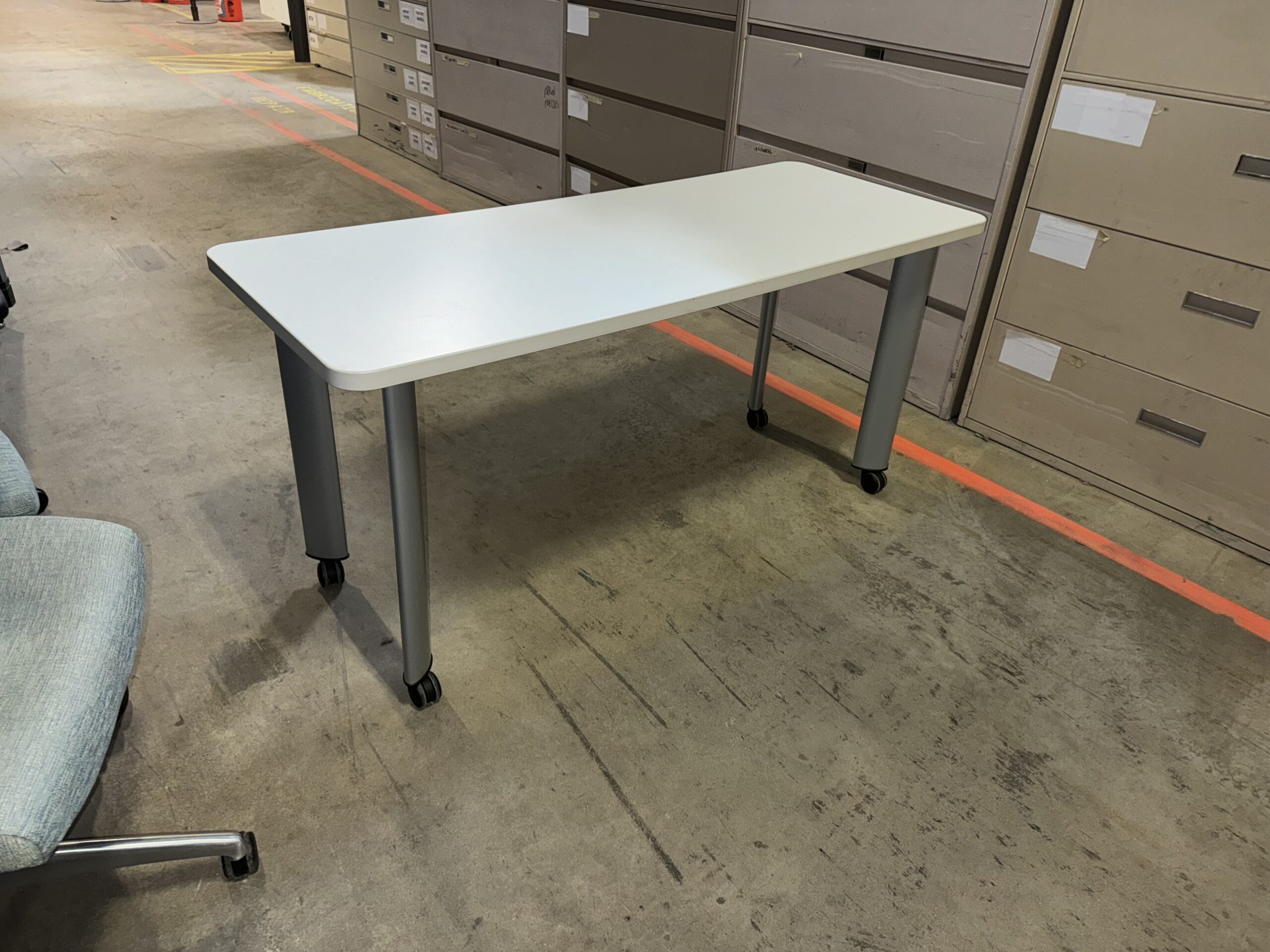 Used White Table with Rolling Casters 60"W x 24"D