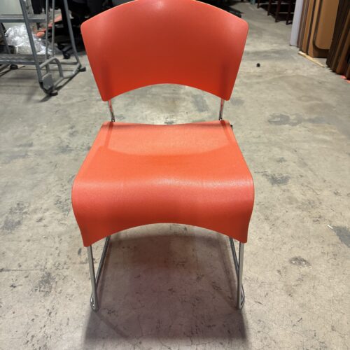 Used Orange Stack Chair Seating Armless
